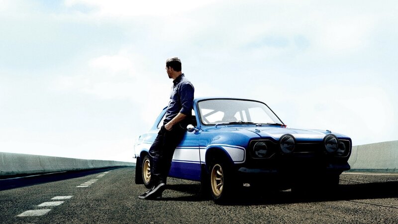 Man Leaning on Blue Car — Dramatic, Afternoon, Photograph