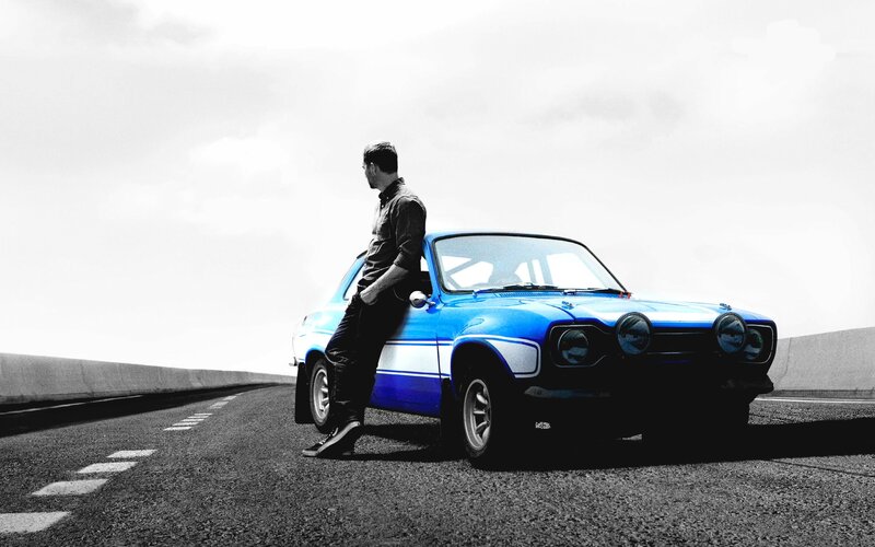 Man Leaning on Blue Car — Dramatic, Photograph