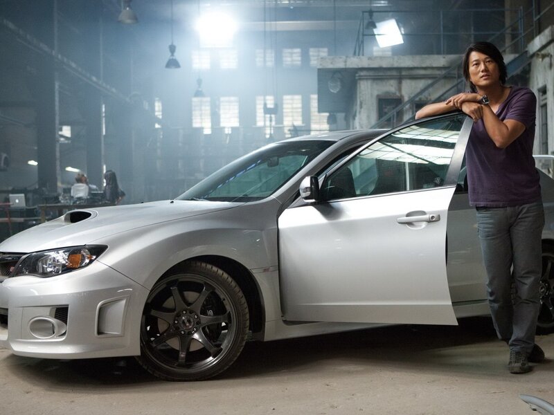 Man Leaning on Car — Silver, Dramatic