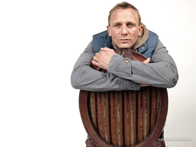 Man Leaning on Chair
