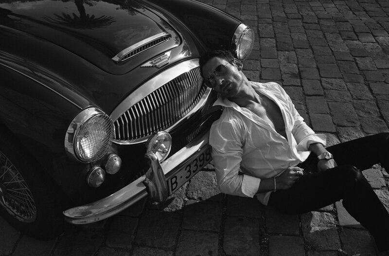 Man Leaning on Classic Car — Black