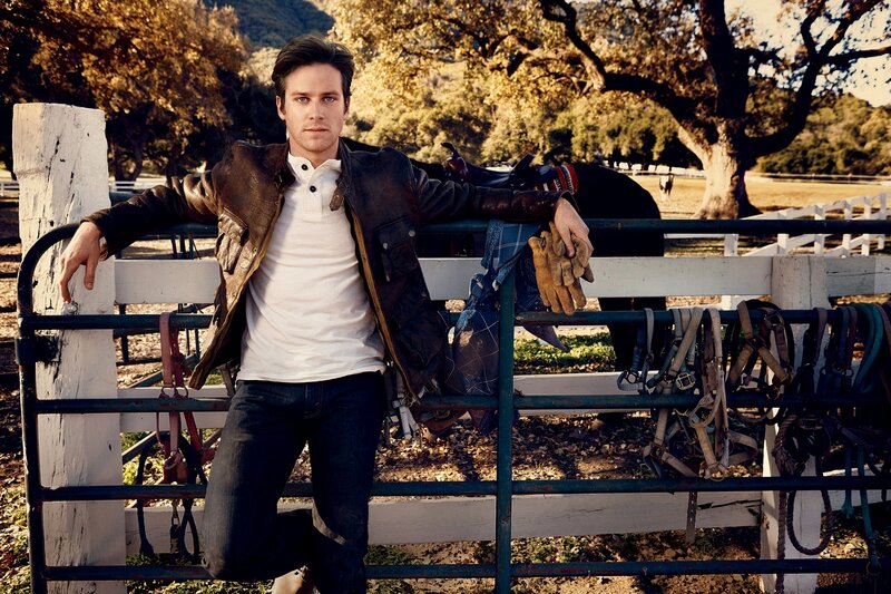 Man Leaning on Fence — Brown