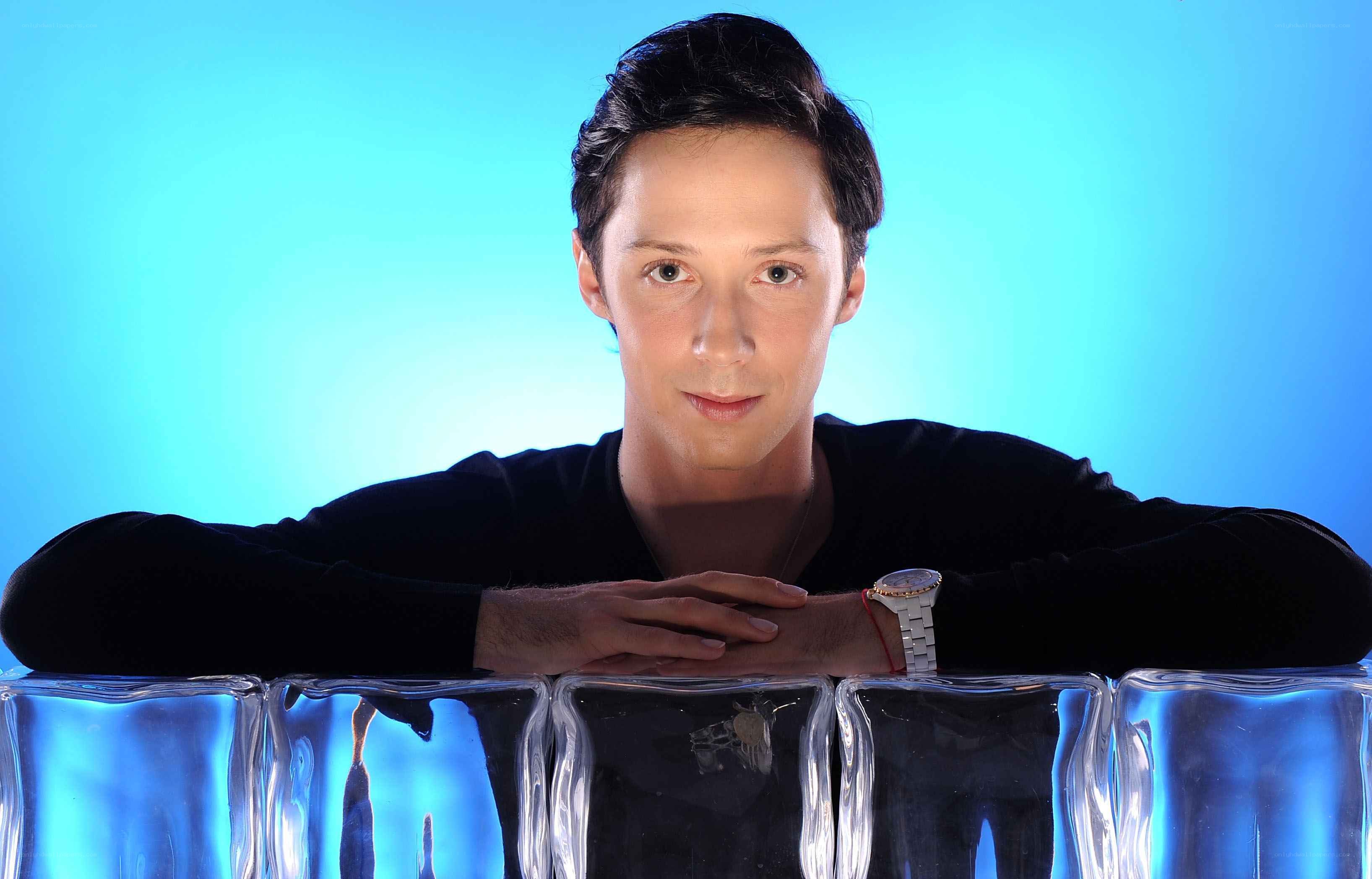 man leaning on glass blocks