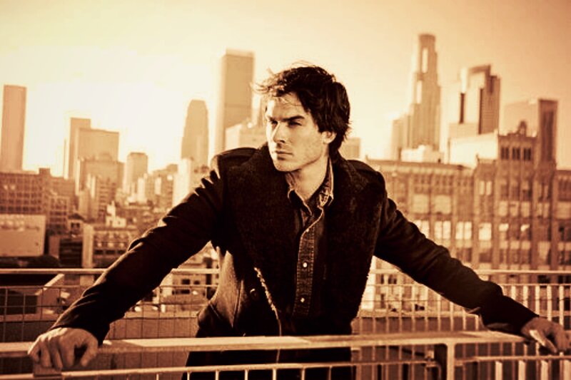 Man Leaning on Railing — Sepia