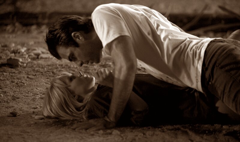Man Leaning over Woman