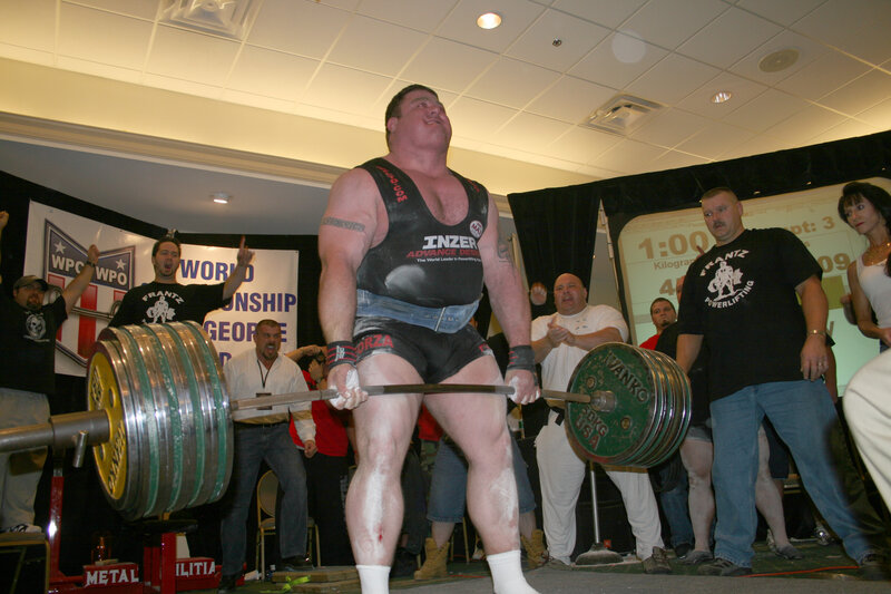 Man Lifting Barbell