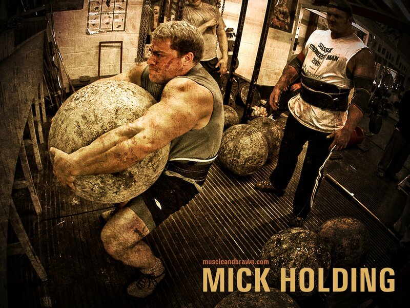 Man Lifting Stone Ball