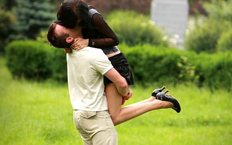 Man Lifting Woman — Green, Romantic