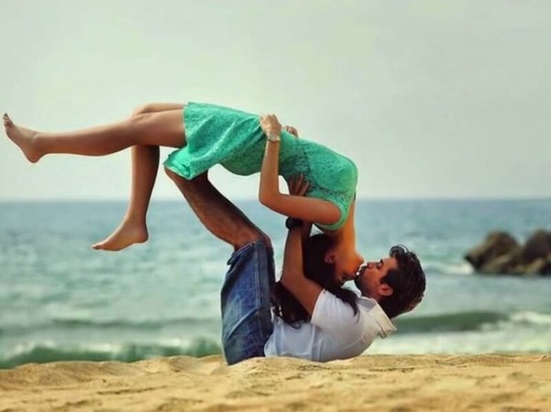 Man Lifting Woman on Beach — Green