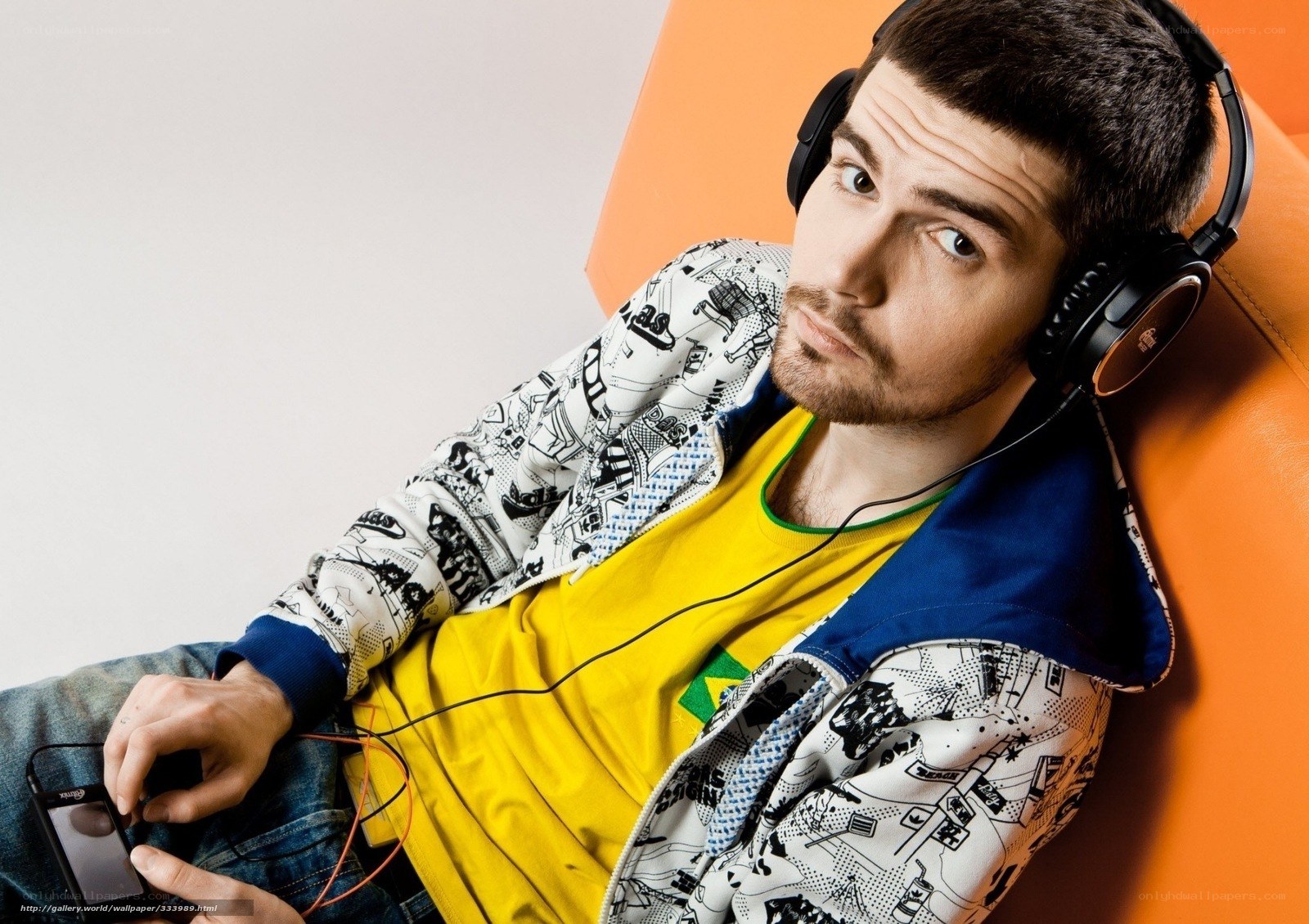 man listening to music on phone