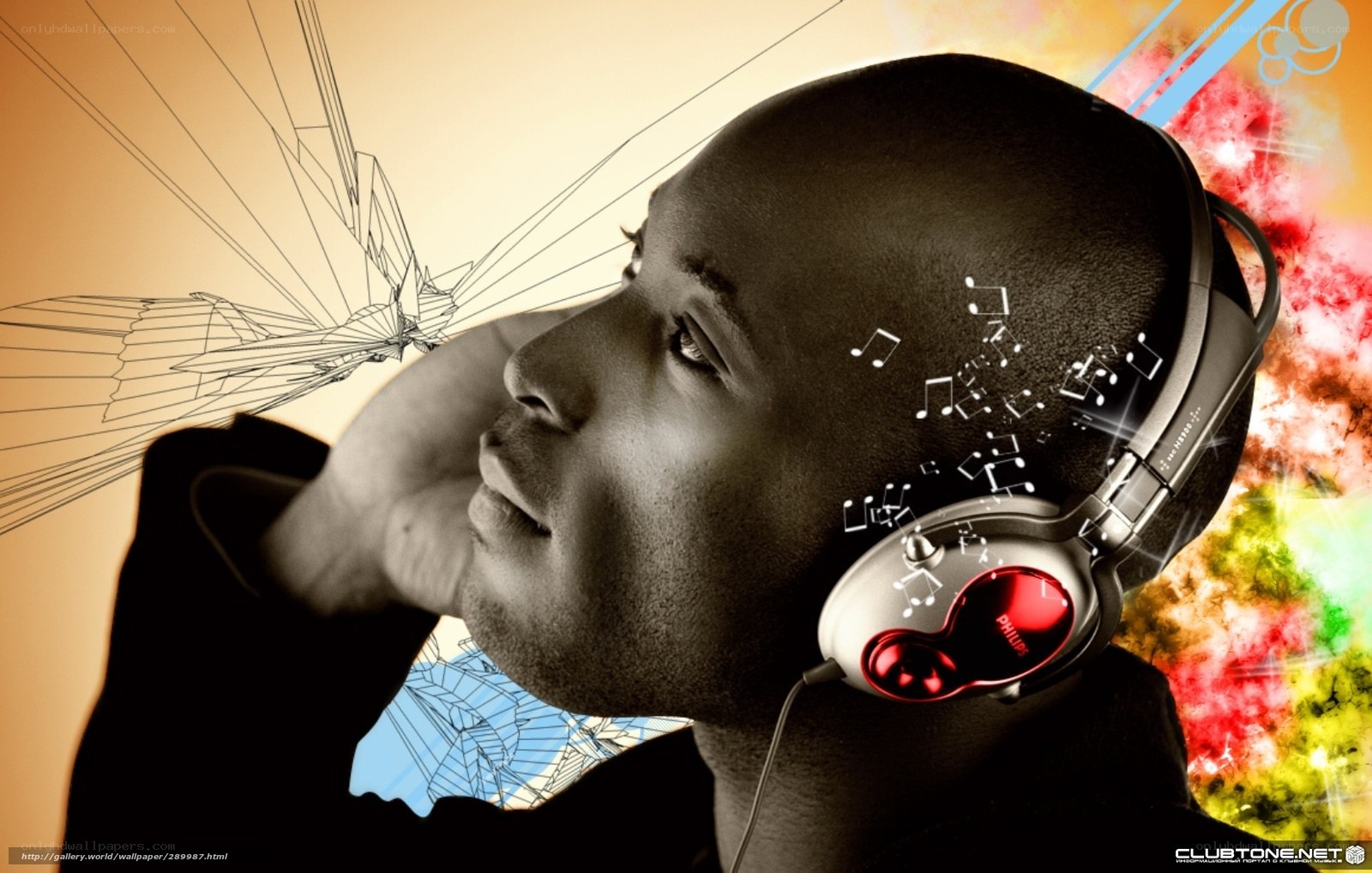 man listening to music with headphones