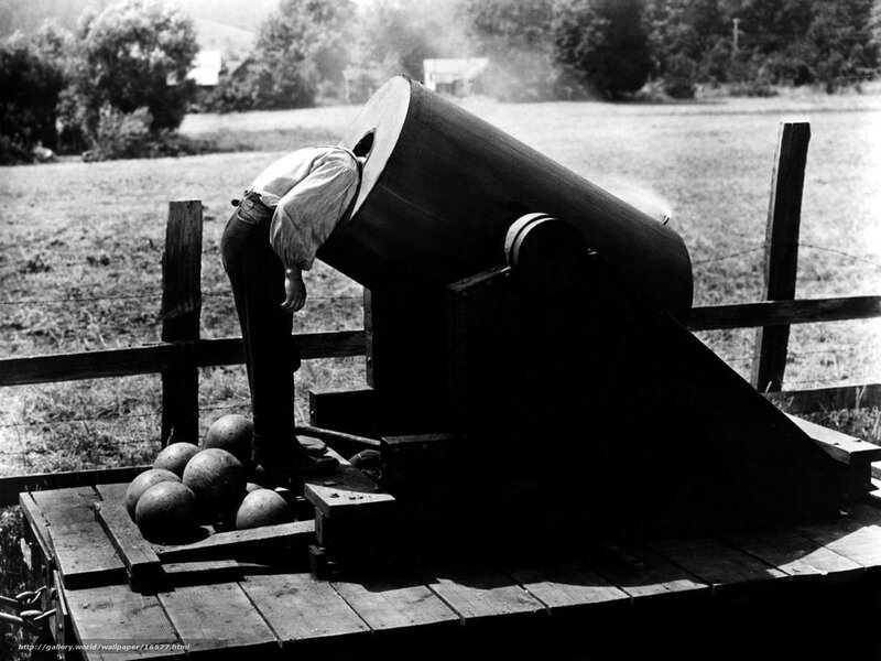 Man loading cannonball