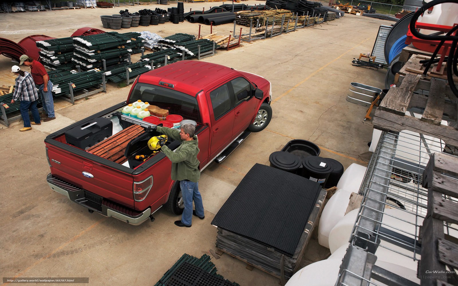 Man loading truck at warehouse