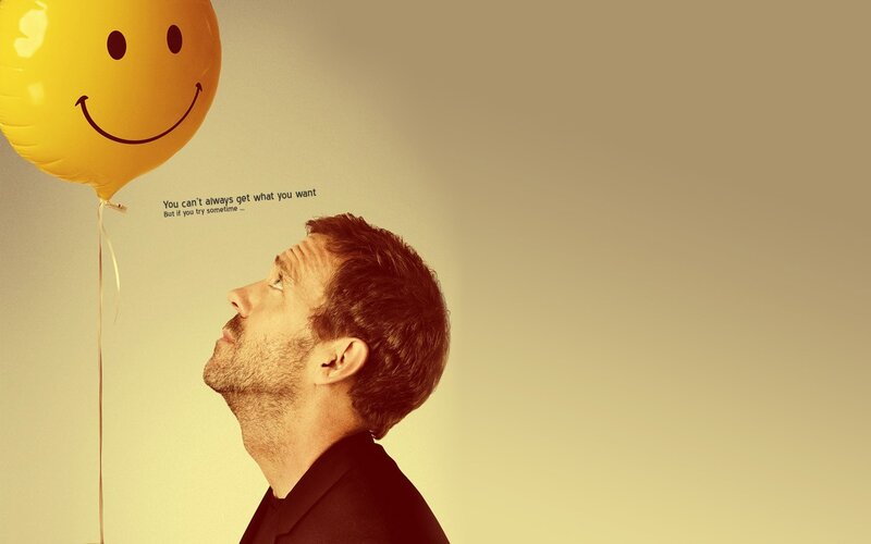 Man Looking at Balloon