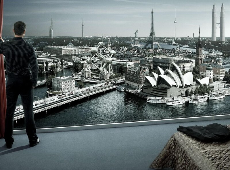 man looking at cityscape