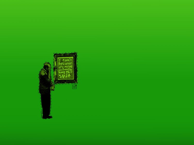 man looking at framed text