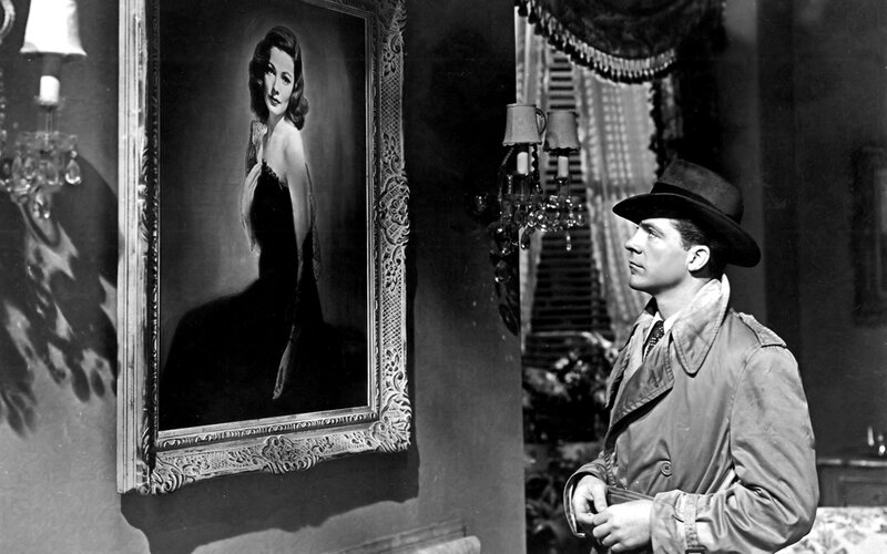 Man looking at portrait