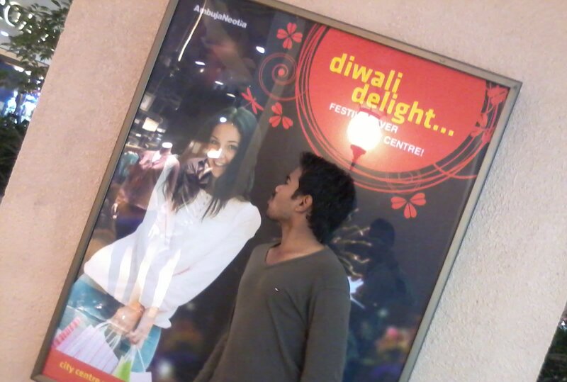 Man Looking at Poster