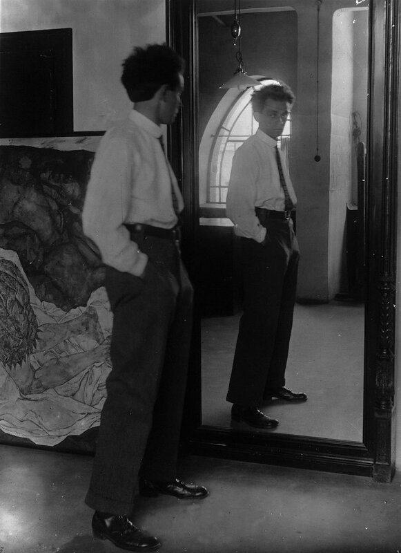 Man looking in a mirror
