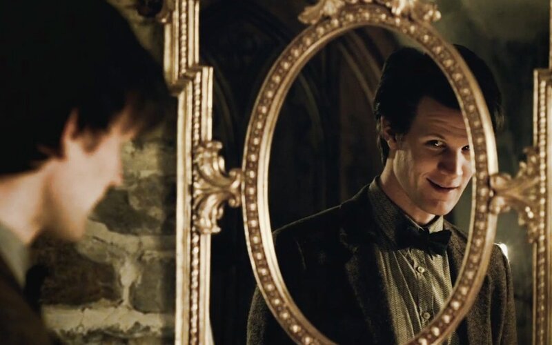 man looking in mirror