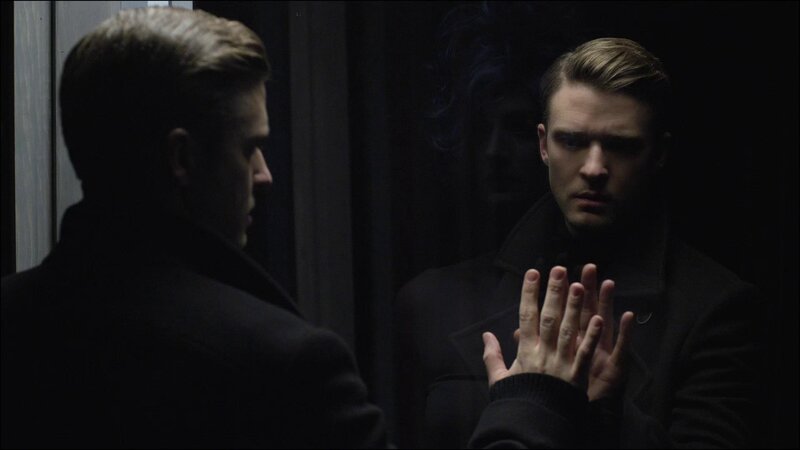 Man Looking in Mirror — Black