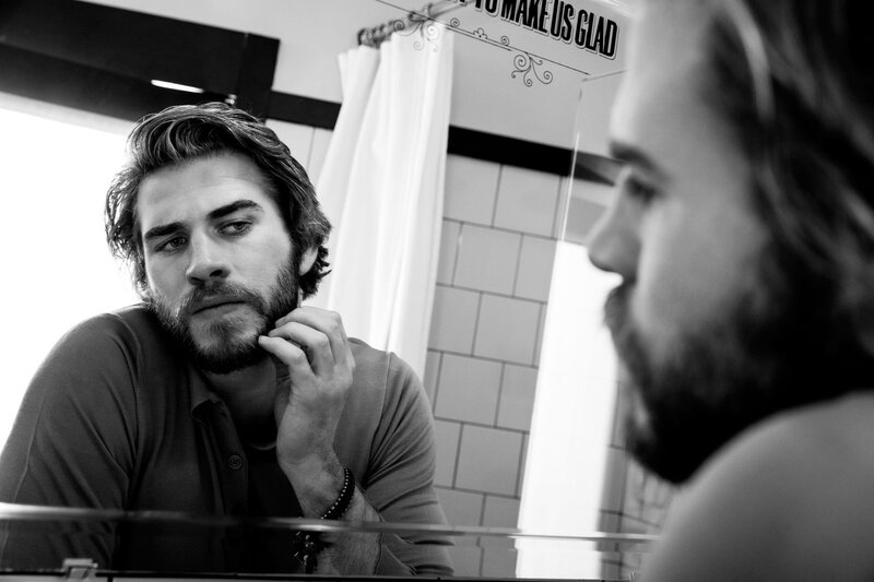 man looking in mirror