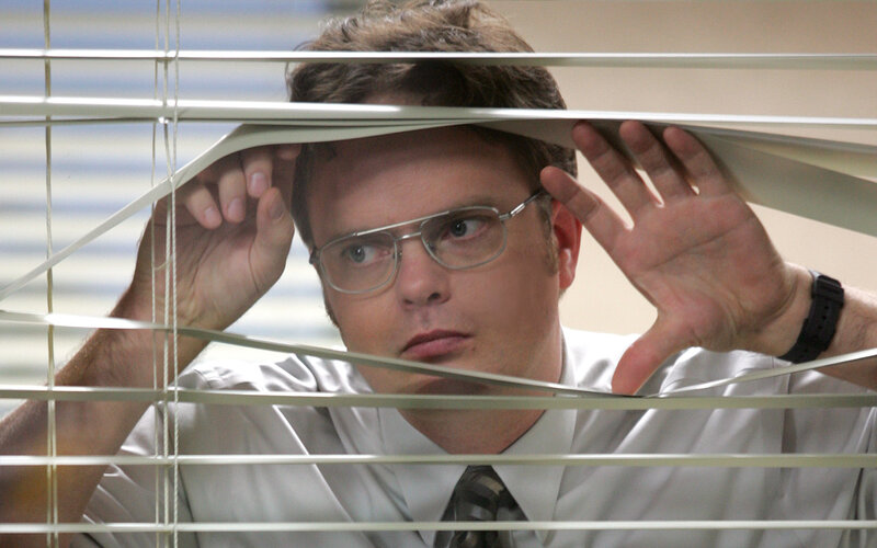 Man Looking Through Blinds — White