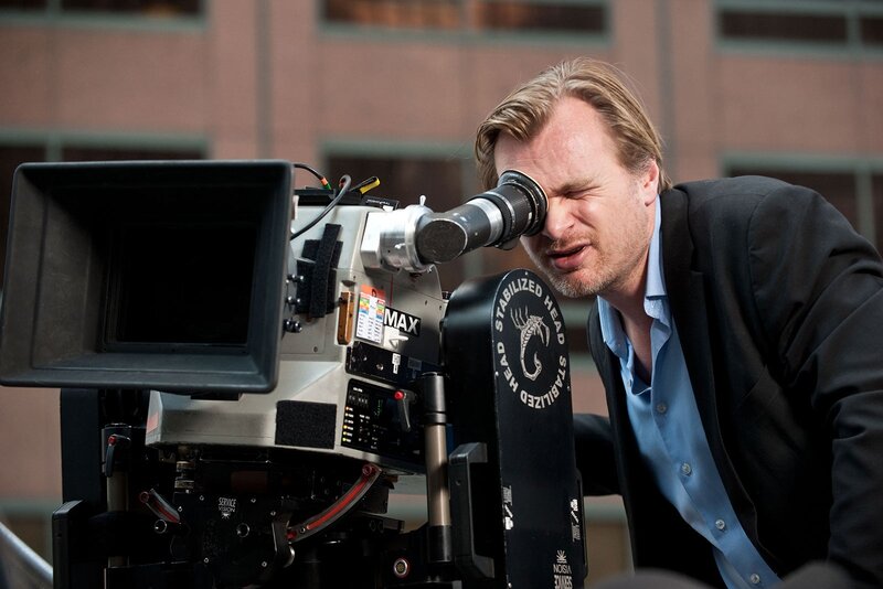 Man Looking Through Camera