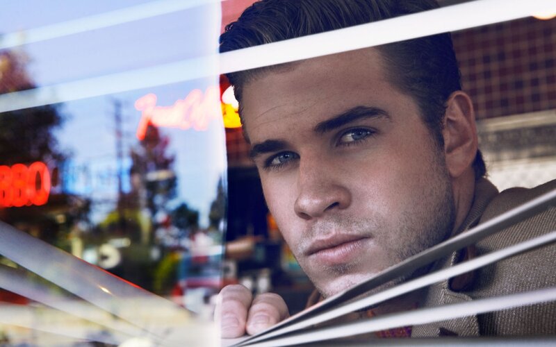 Man Looking Through Window — Brown
