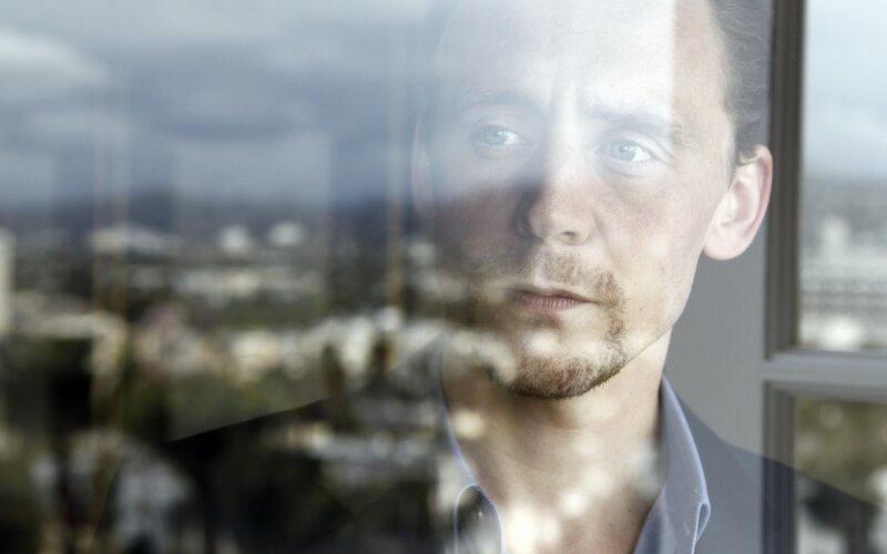 Man Looking Through Window — Gray