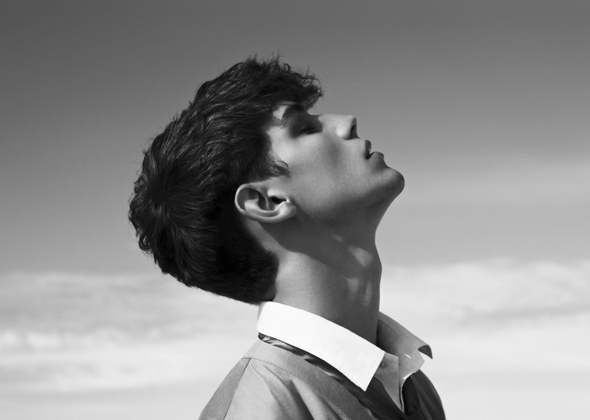 man looking up at sky