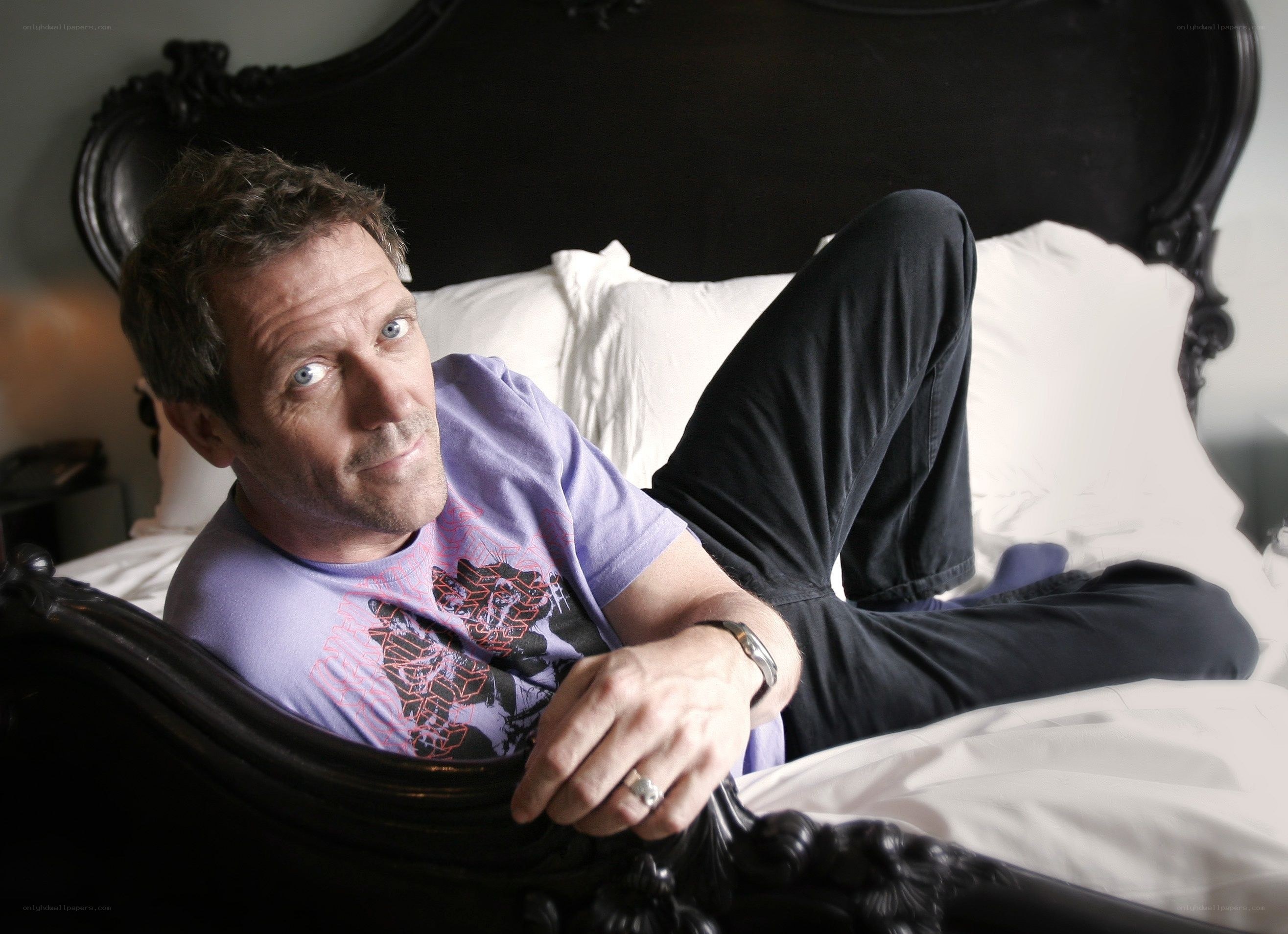 man lying on a bed