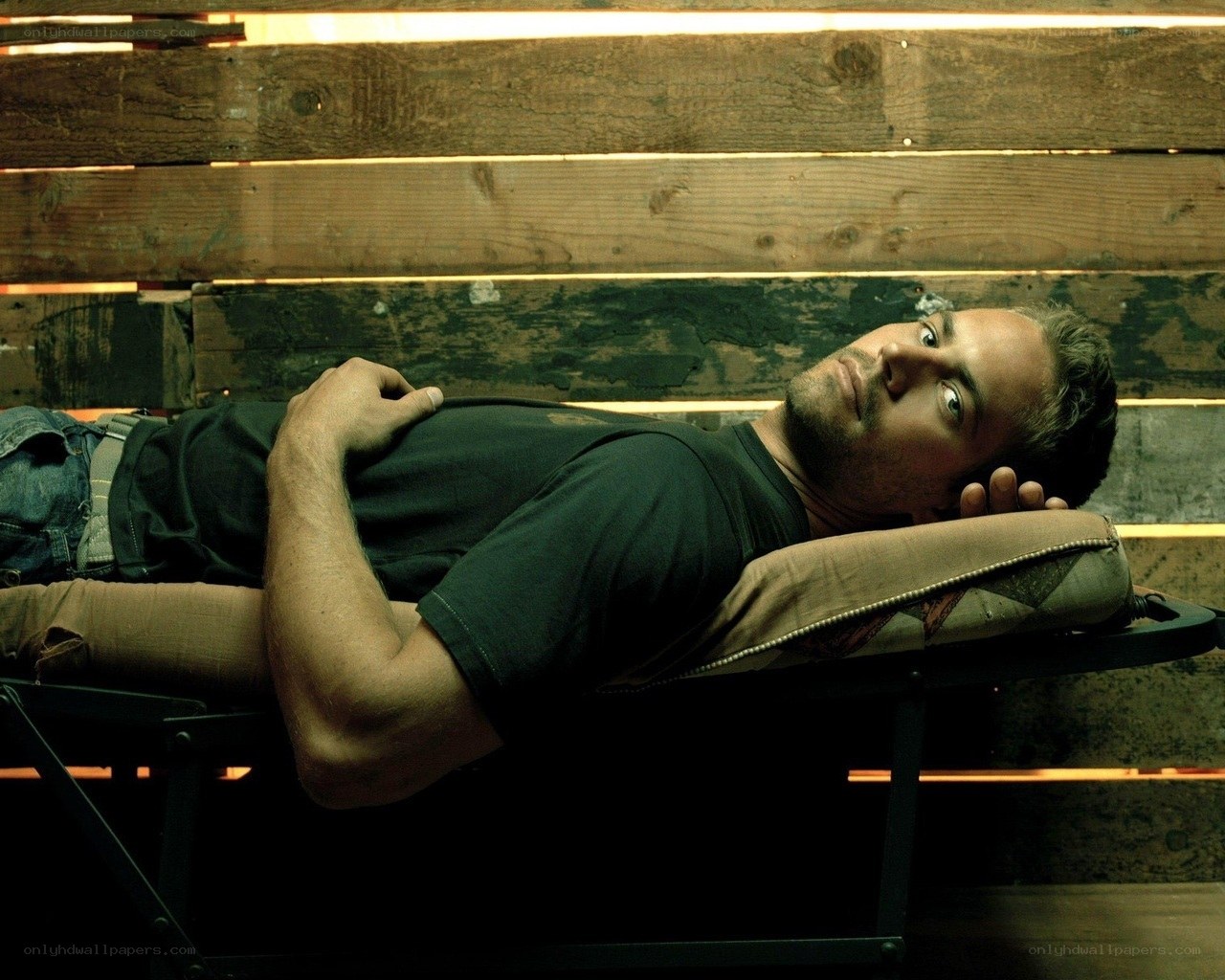 man lying on a bench
