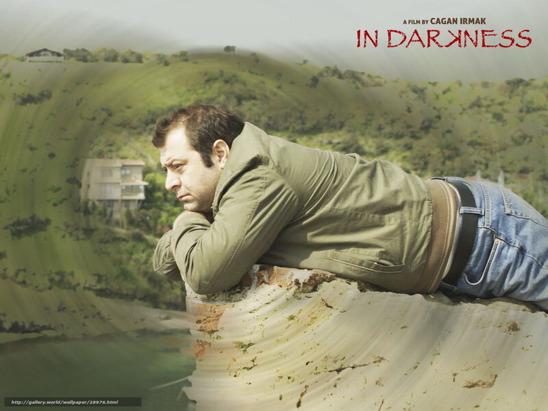 man lying on a wall