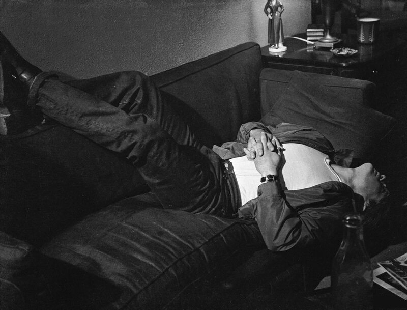 Man Lying on Couch — Black