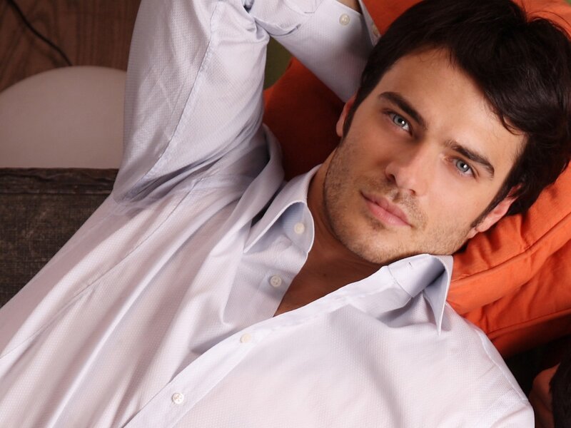 Man Lying on Couch — White