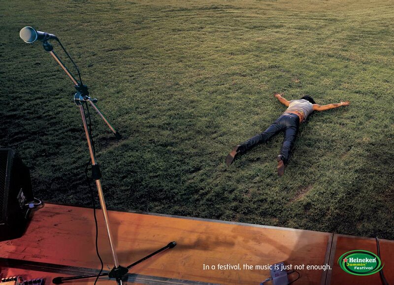 Man lying on grass at festival