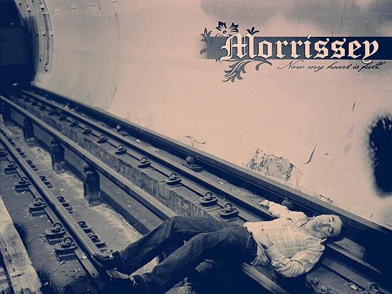 Man lying on train tracks