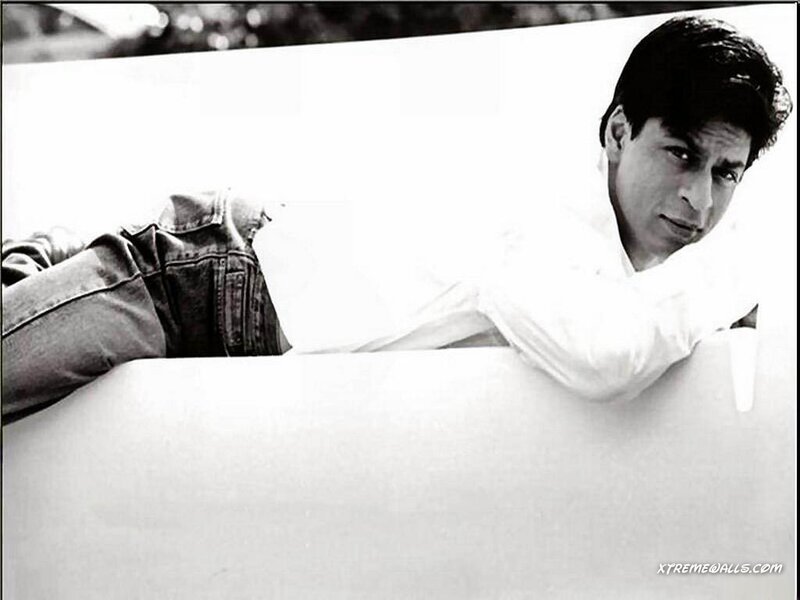 Man Lying on White Surface — Black