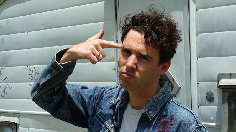 Man making gun gesture