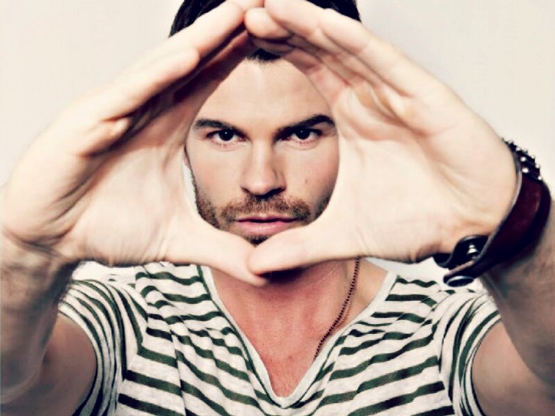 Man Making Heart Shape — White, Playful