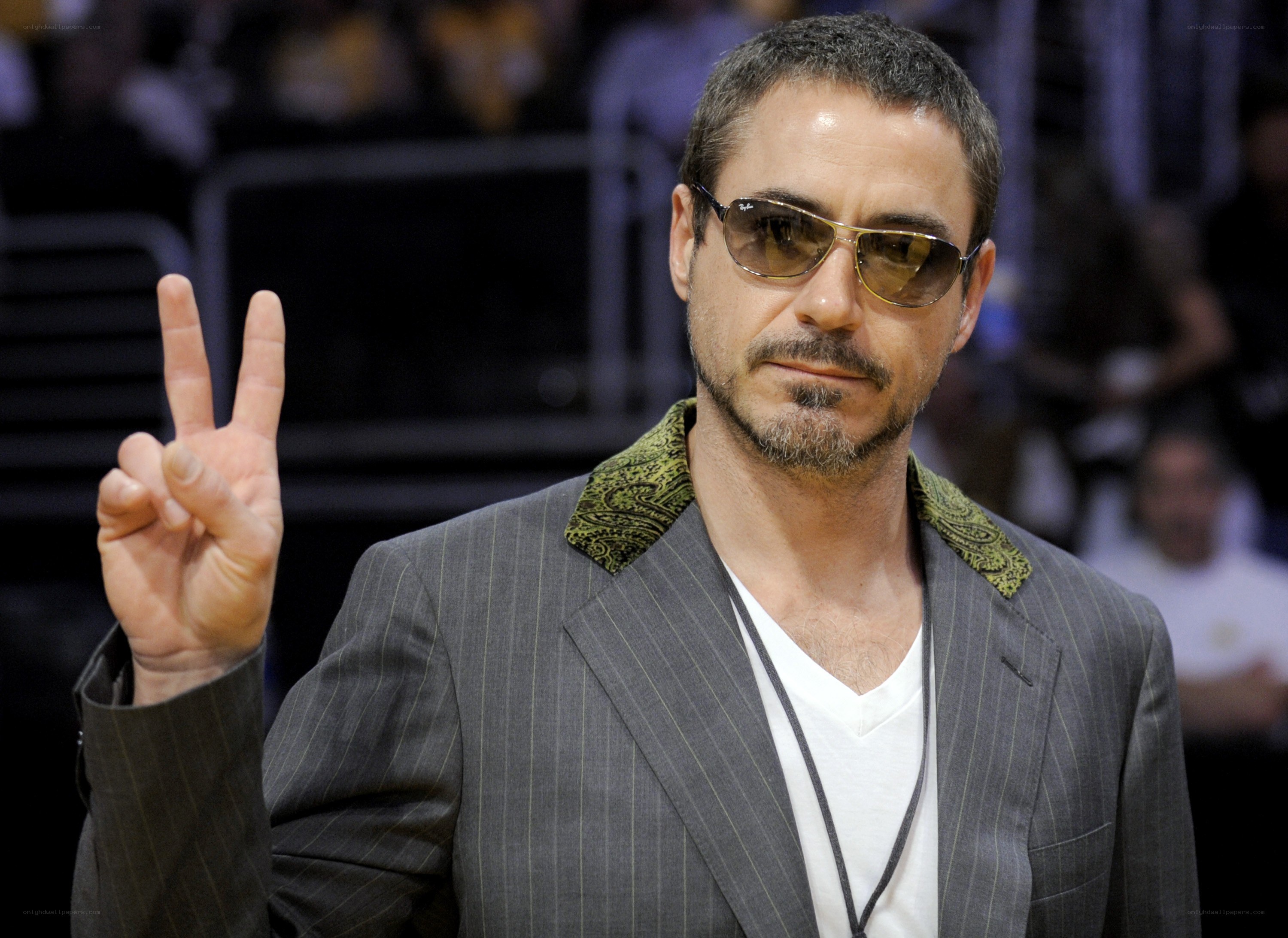 man making peace sign