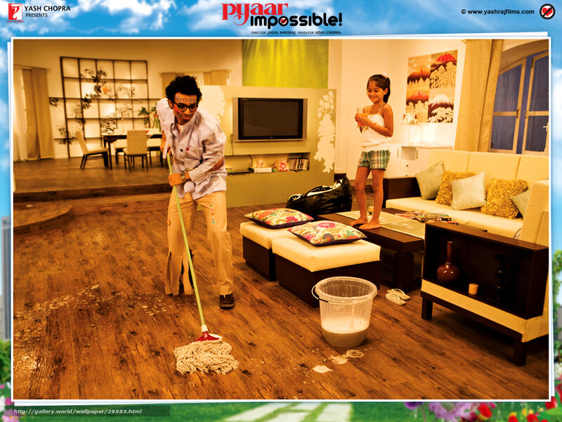 Man mopping floor with girl watching