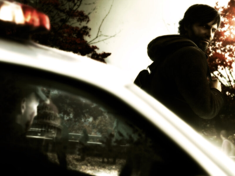 man near police car at dusk