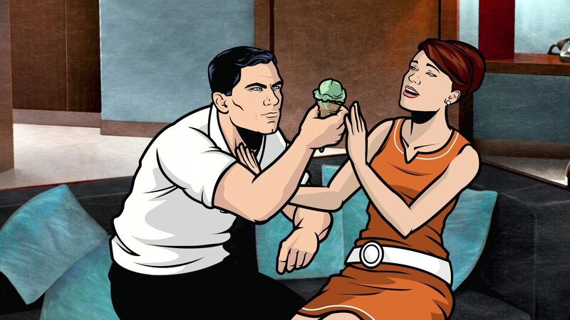 man offering ice cream to woman