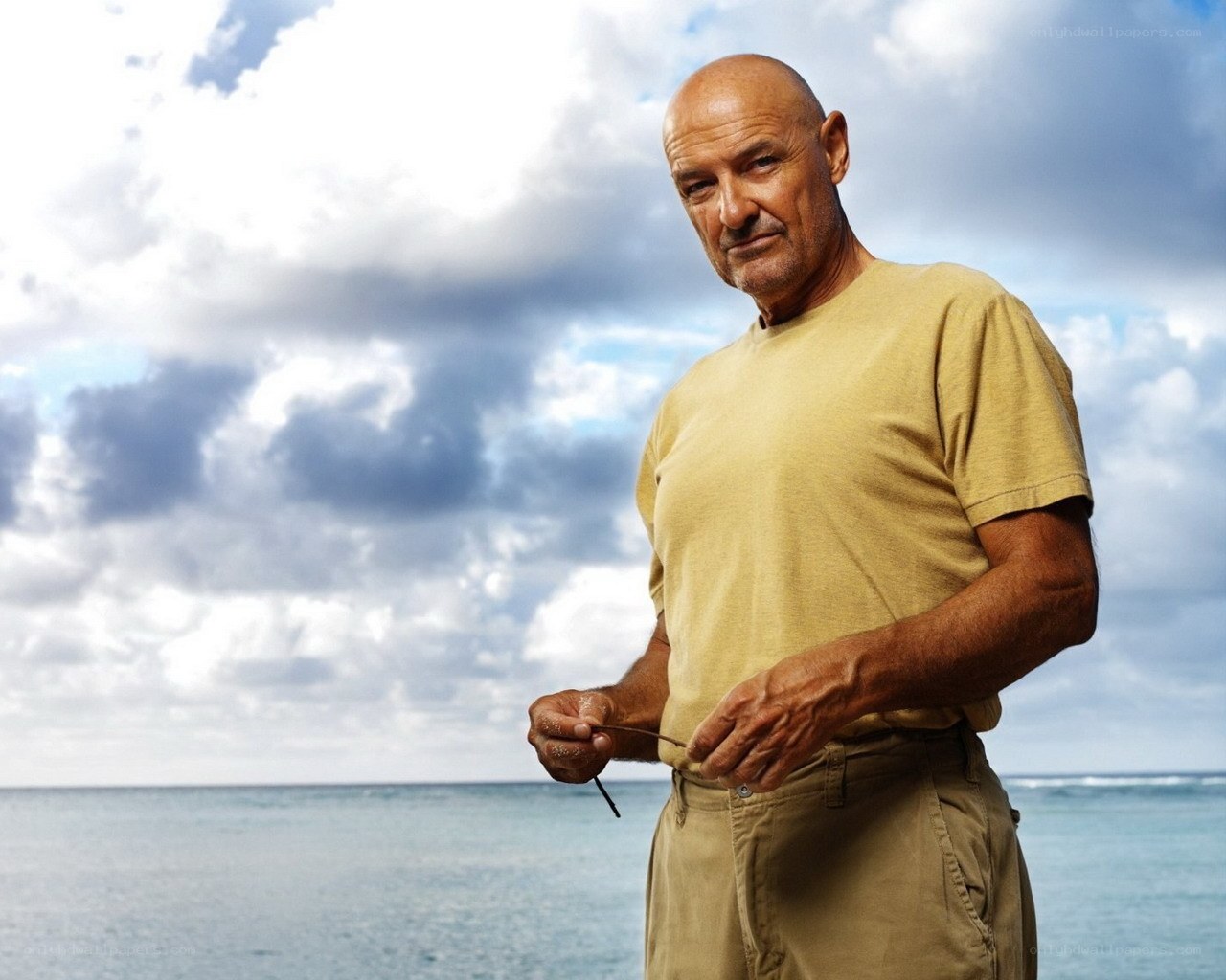 Man on a beach with ocean view