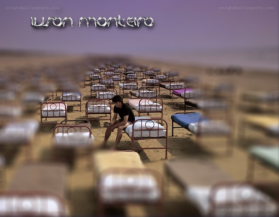 Man on a bed in desert
