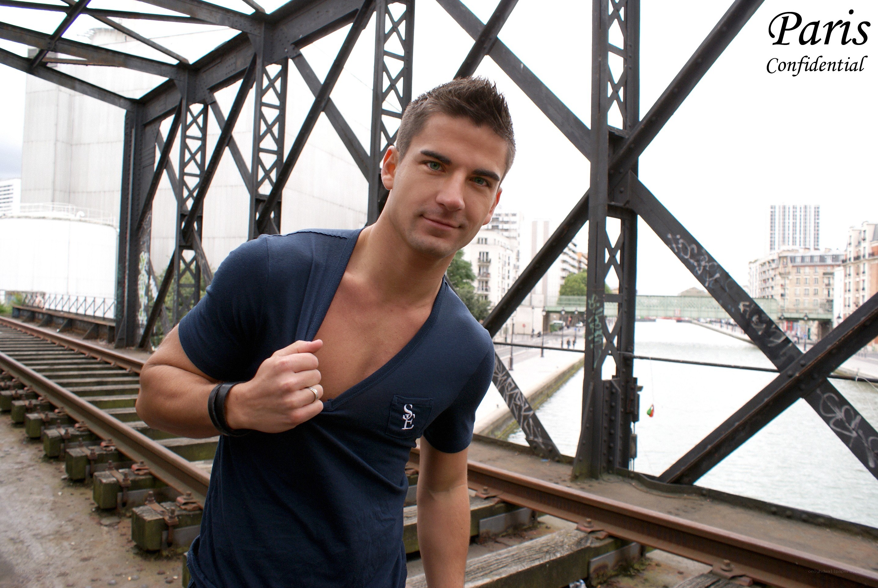 Man on a bridge in Paris