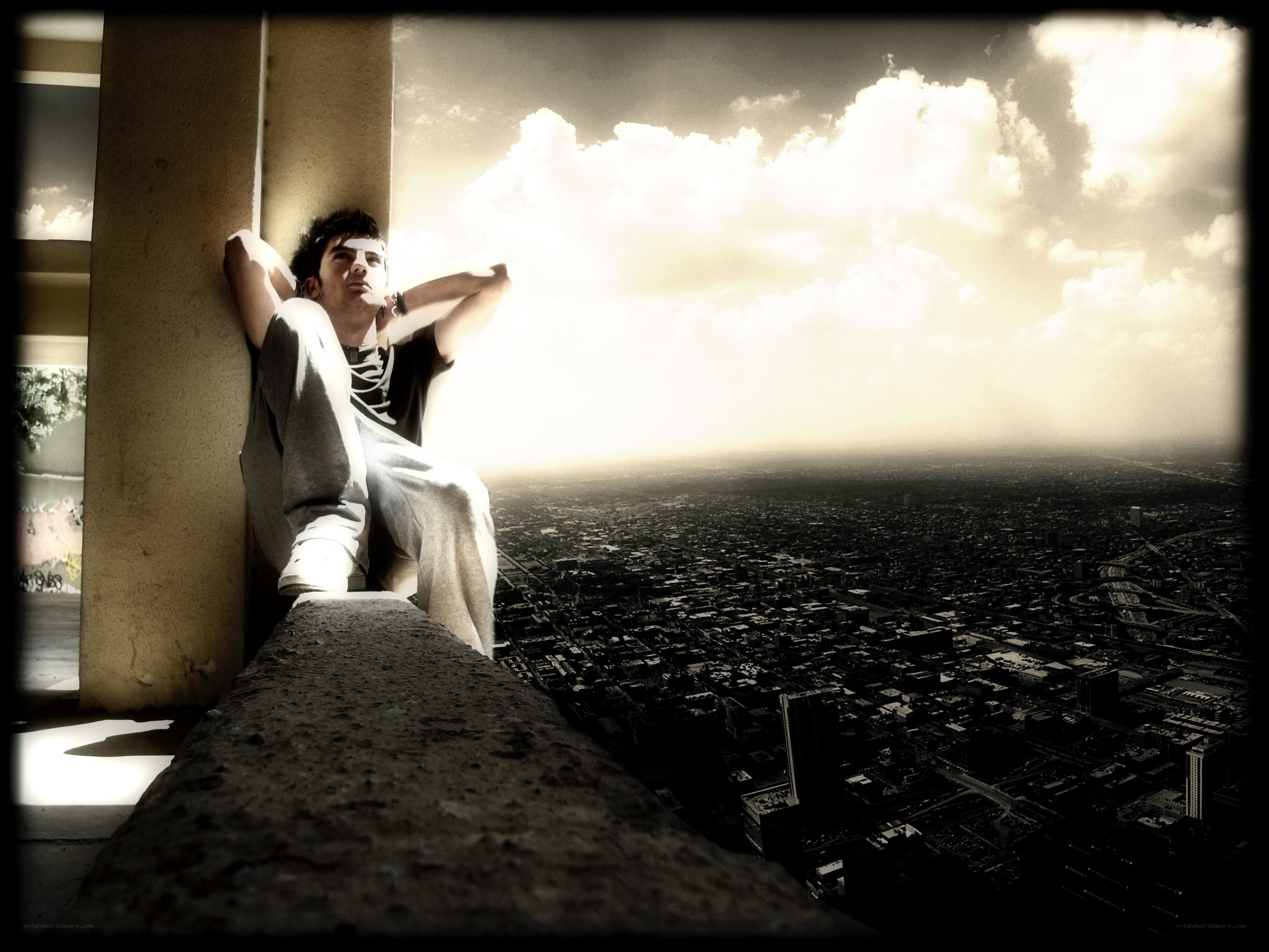 Man on a high ledge