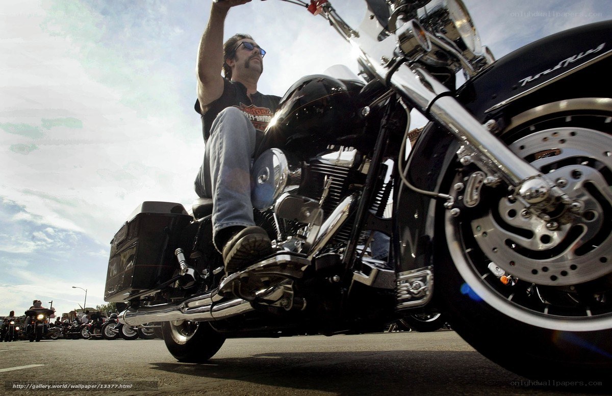 Man on a motorcycle at a rally